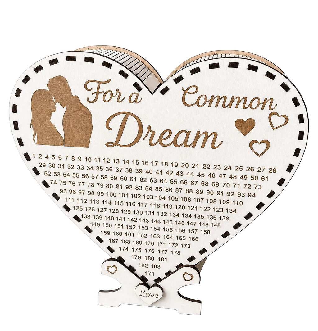 Heart-shaped wooden savings box with “For a Common Dream” engraving, couple silhouette, heart details, love tag, and a numbered savings tracker.