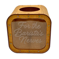Wooden tip jar with a clear front panel and engraved text “For the Barista’s Nerves”, designed for tips or small cash contributions.